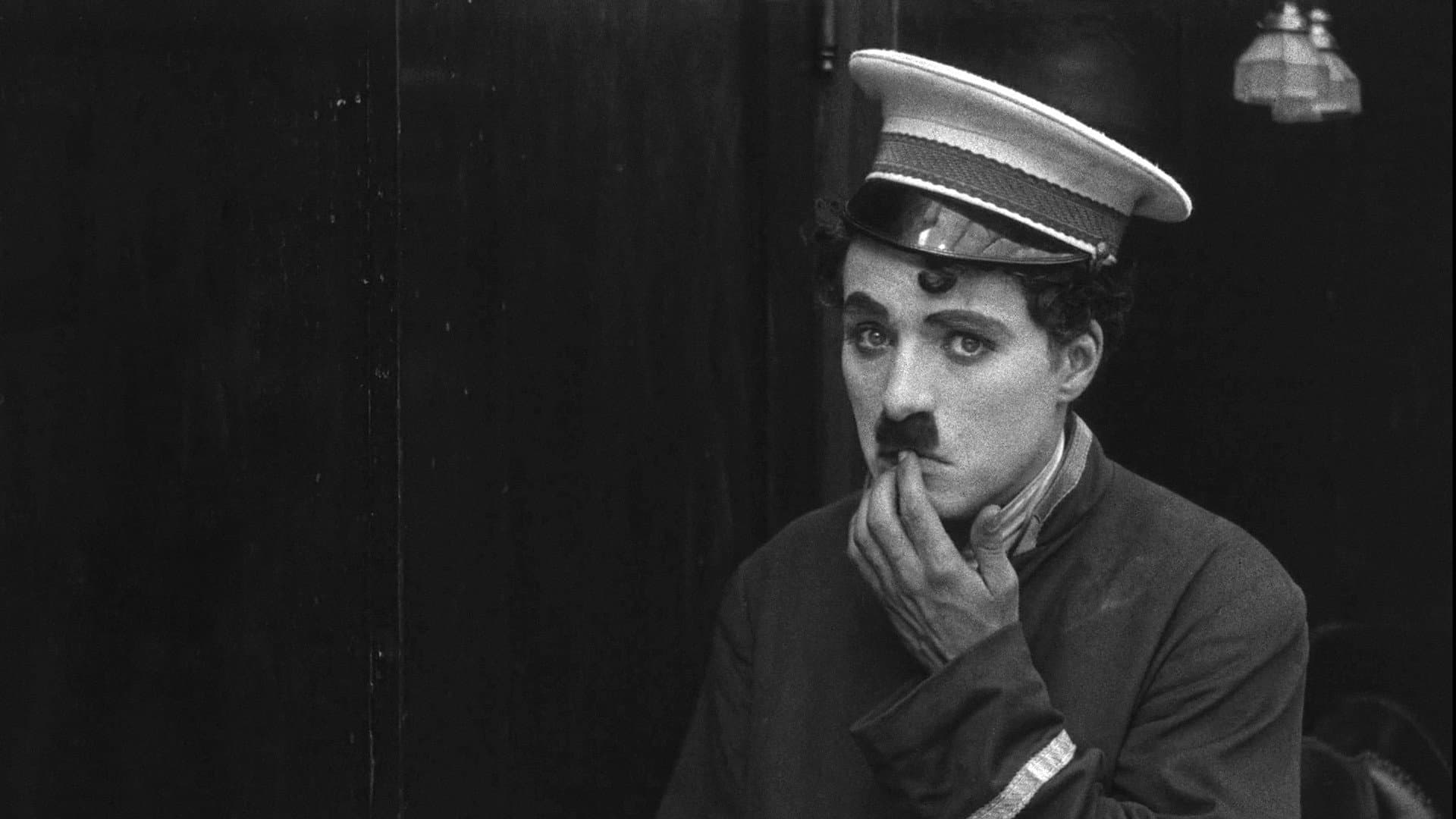 Charlot inserviente di banca - immagine